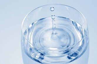 Boy Urinates Into Glass