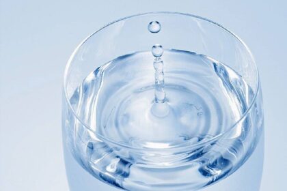 Boy Urinates Into Glass